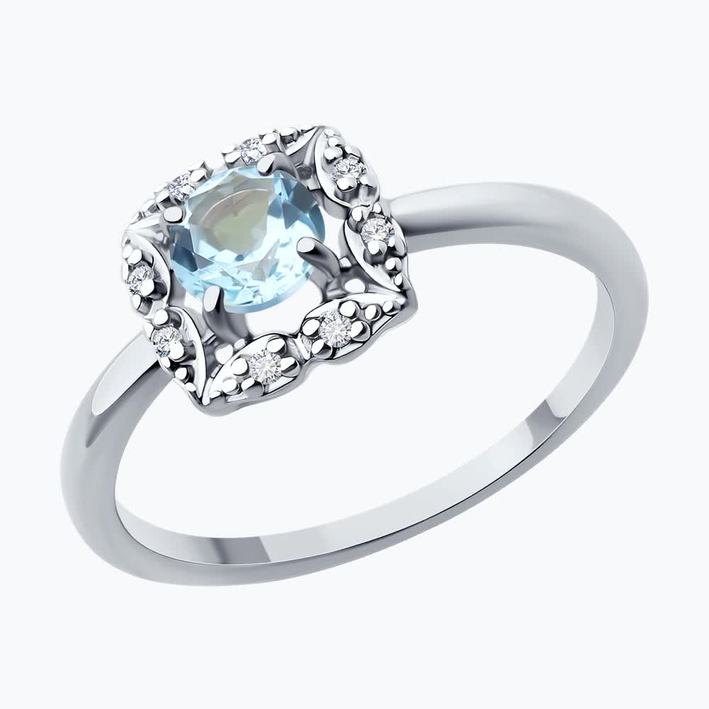 Кольцо из серебра с топазом и фианитами